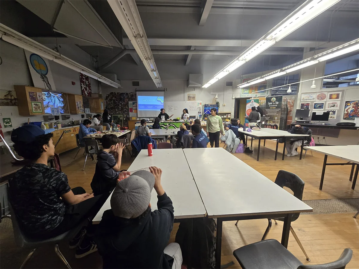Empower youth group attentively participating in community session