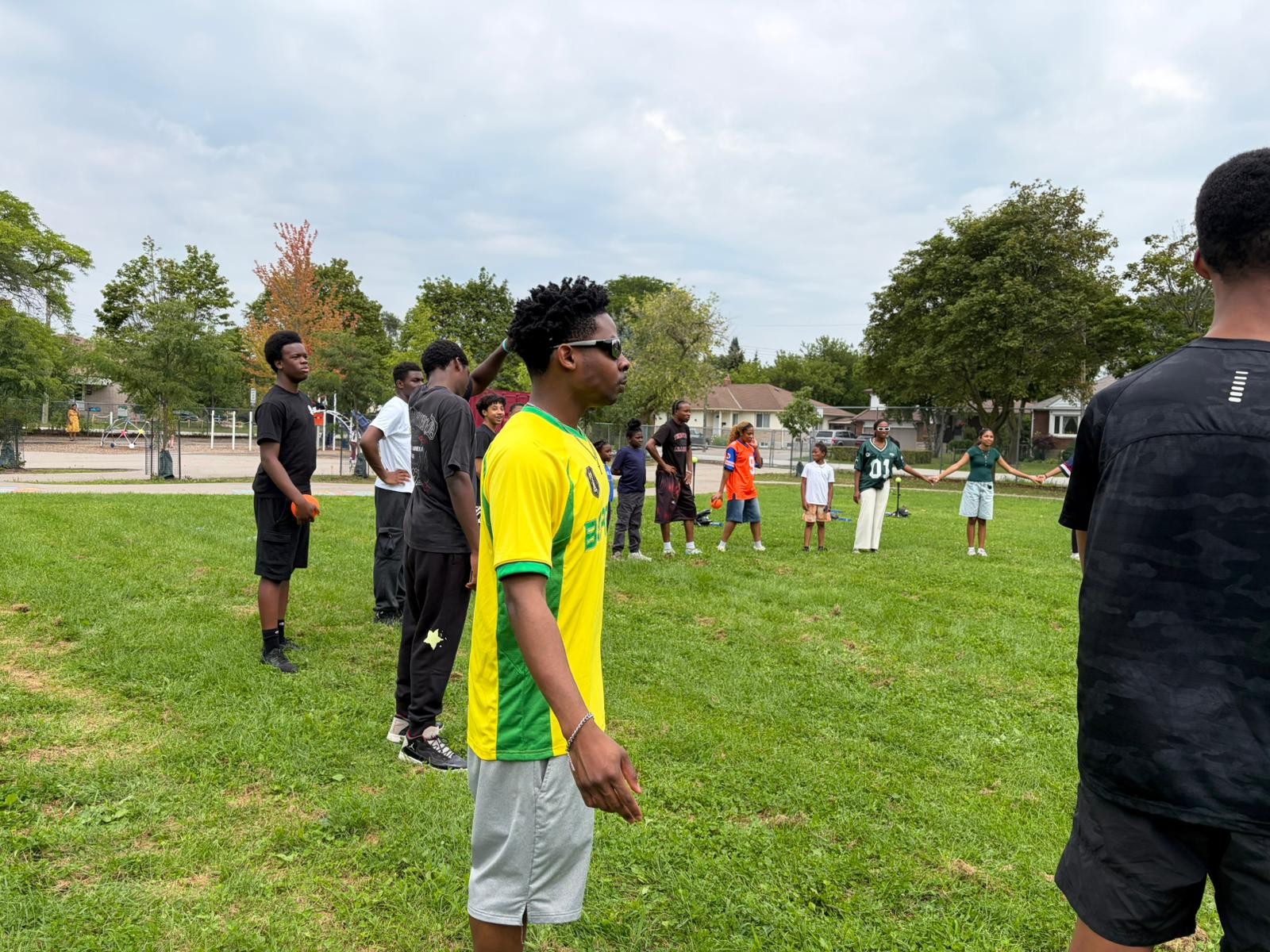 Youth gathering together for friendly athletic challenges in Toronto