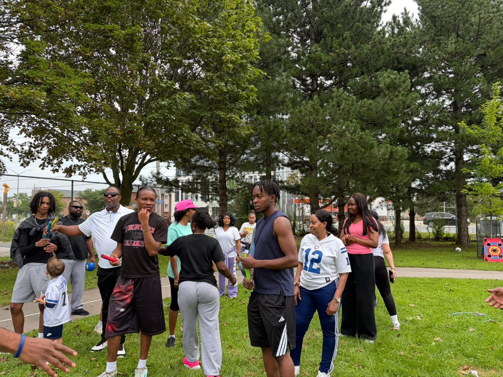 Youth coaches modeling positive leadership and teamwork in Toronto