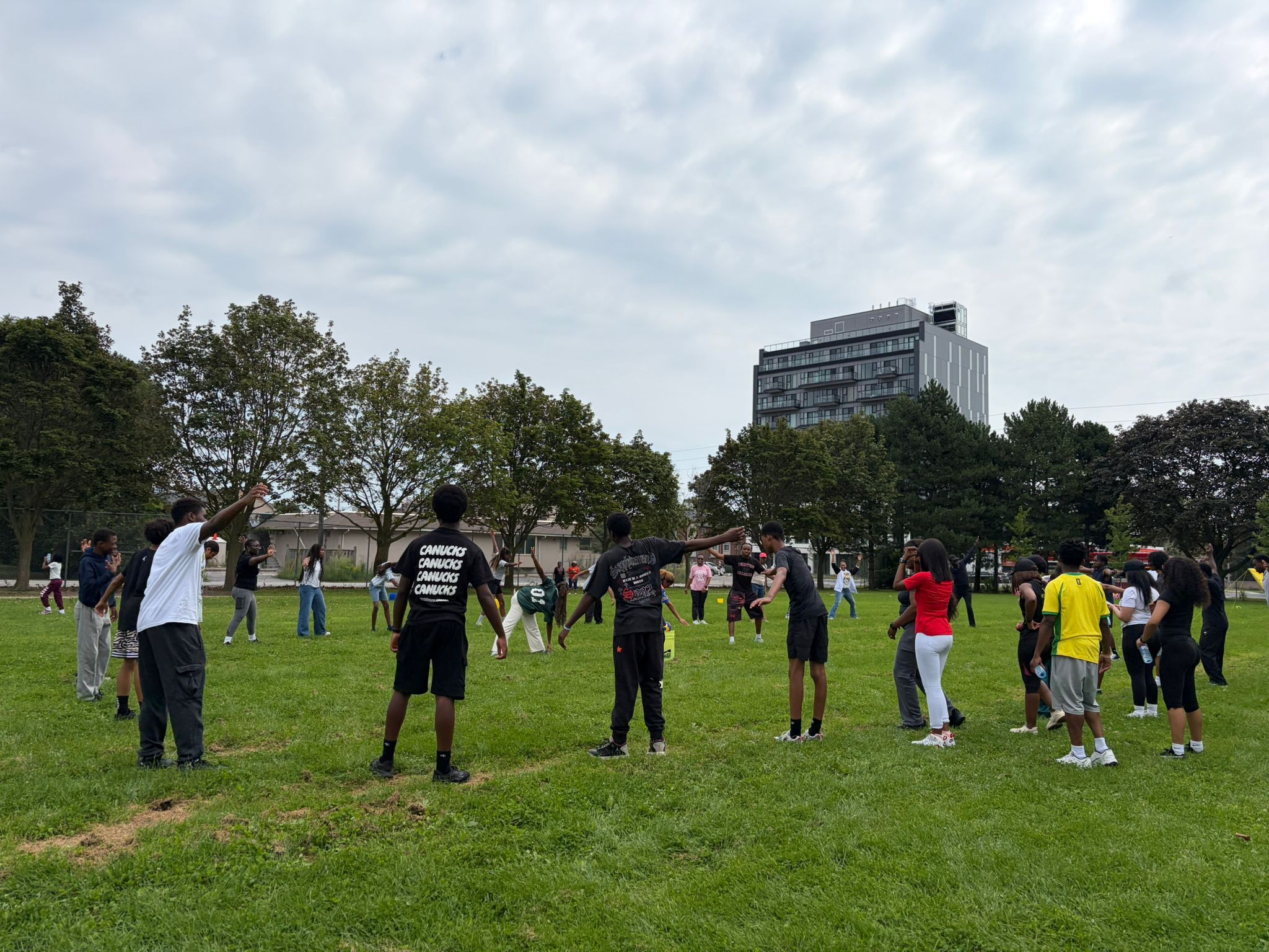 Youth participants engaging in healthy group movement in Toronto