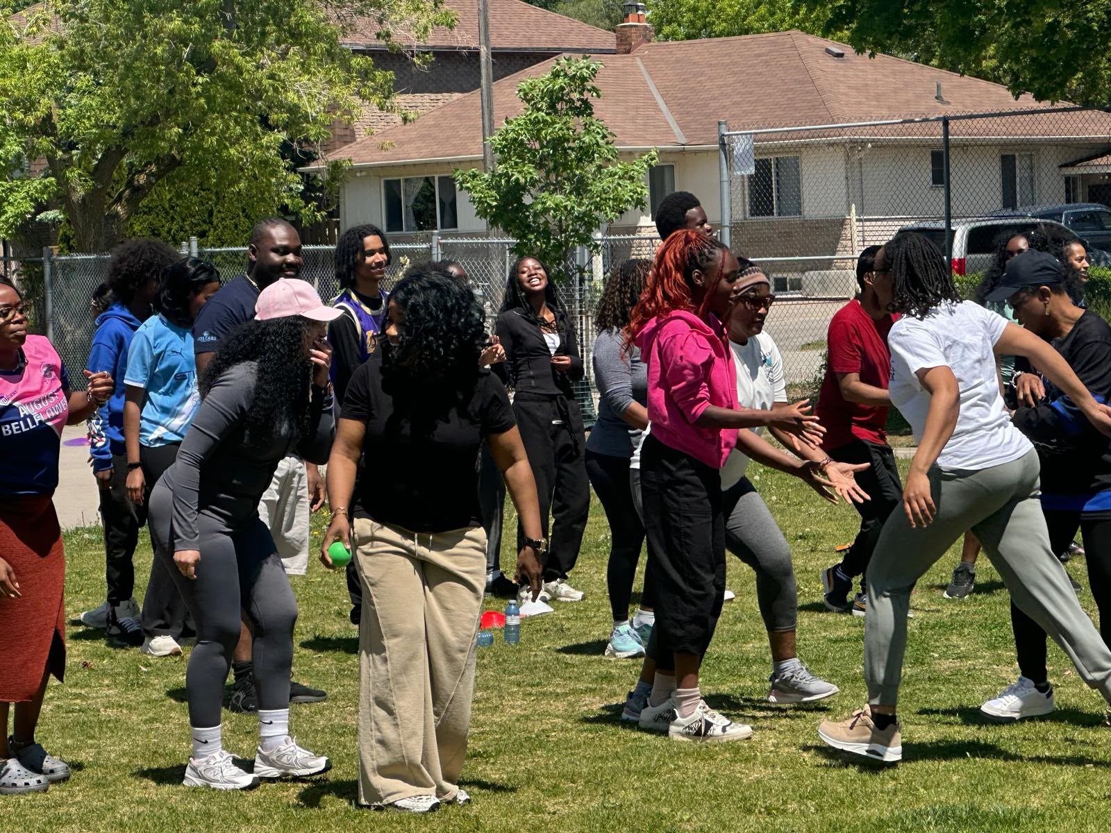 Empower To Thrive community members and youth gathering together in Toronto