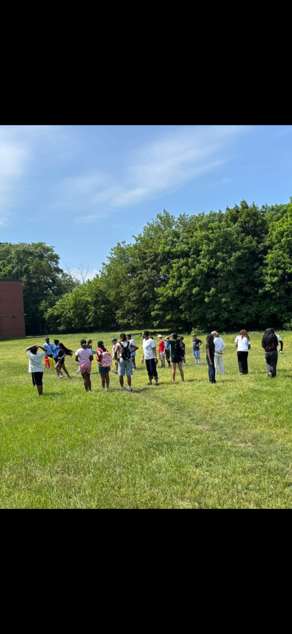 Wide view of the summer youth leadership field day in Toronto